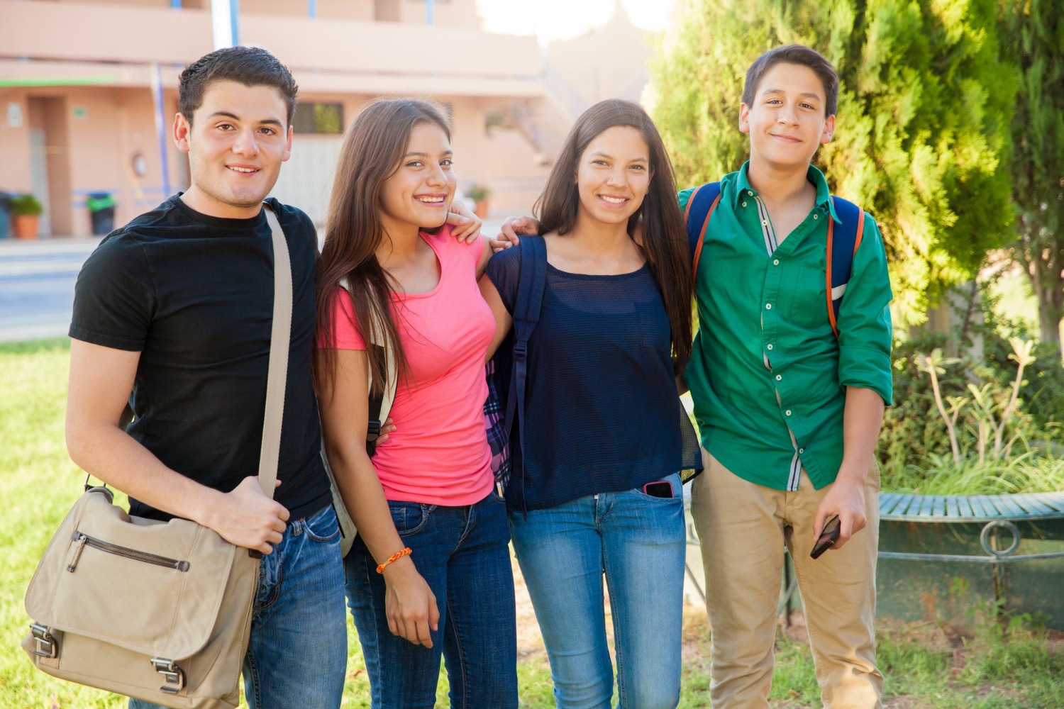 portrait group high school teenagers hanging out outdoors - ePlanet